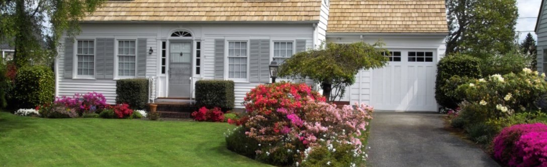 Front of house with tidy lawn